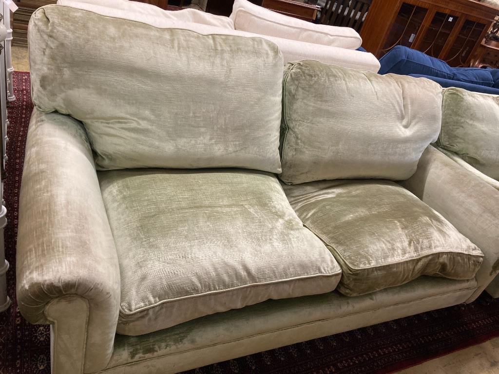 A George Smith two seater settee upholstered in pale green velvet, length 190cm, depth 90cm, height 82cm